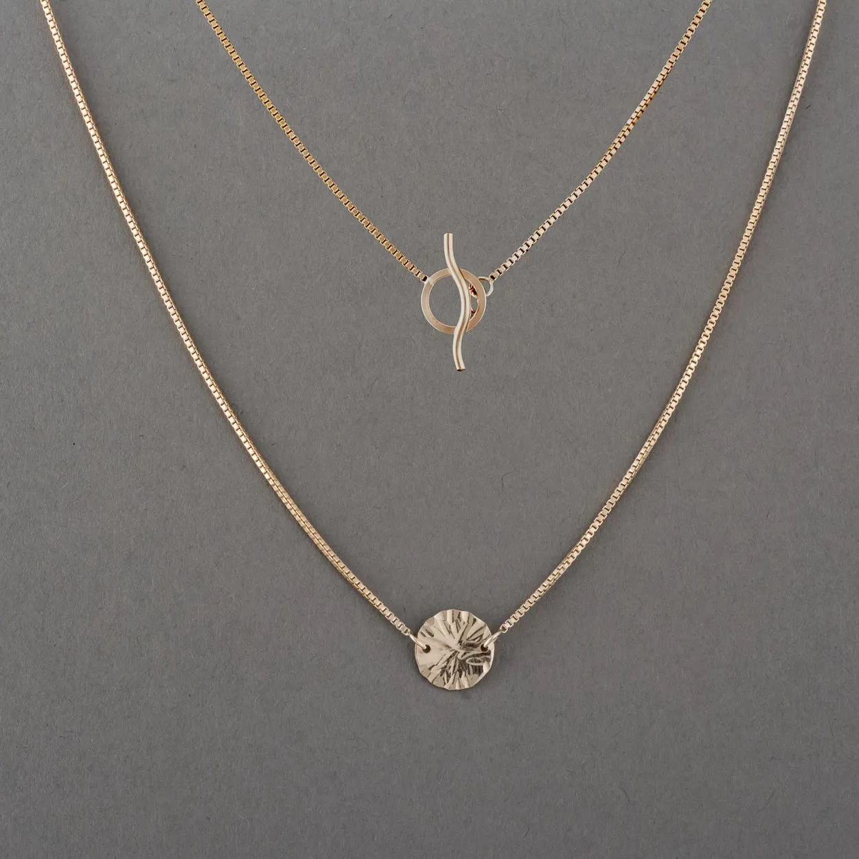 LOTUS & ASP TOGGLE NECKLACE